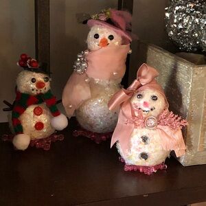 Elegant Snowman Figurine Set with Pink and Red Accents